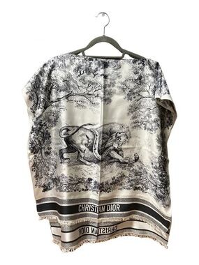 Dior silk poncho with dior signature print. 
Size OS